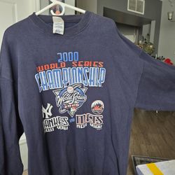vintage 2000 World Series Subway Series crewneck featuring logos for both the New York Yankees and New York Mets. 