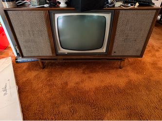 Vintage TV with stand attached