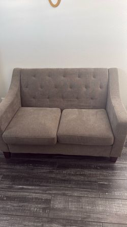 Gray love seat
