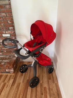 Stokke Xplory Stroller with Bassinet and car seat adapters  - Red