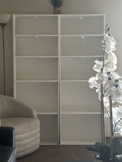 Two bookshelves together Two bookshelves together