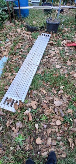 8ft-13ft extending Werner Aluminum walkboard.