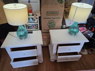 Two nightstands with two lamps