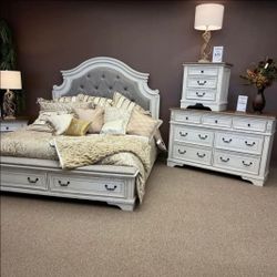 Realyn Chipped White Footboard Storage Platform Bedroom Set
Bed, Dresser, Mirror, and Nightstand