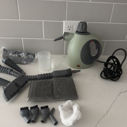 Multi-surface handheld pressure steamer 