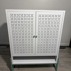 New in bow white metal storage cabinet with adjustable shelves and teal accent legs