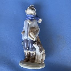 Lladro boy with dog