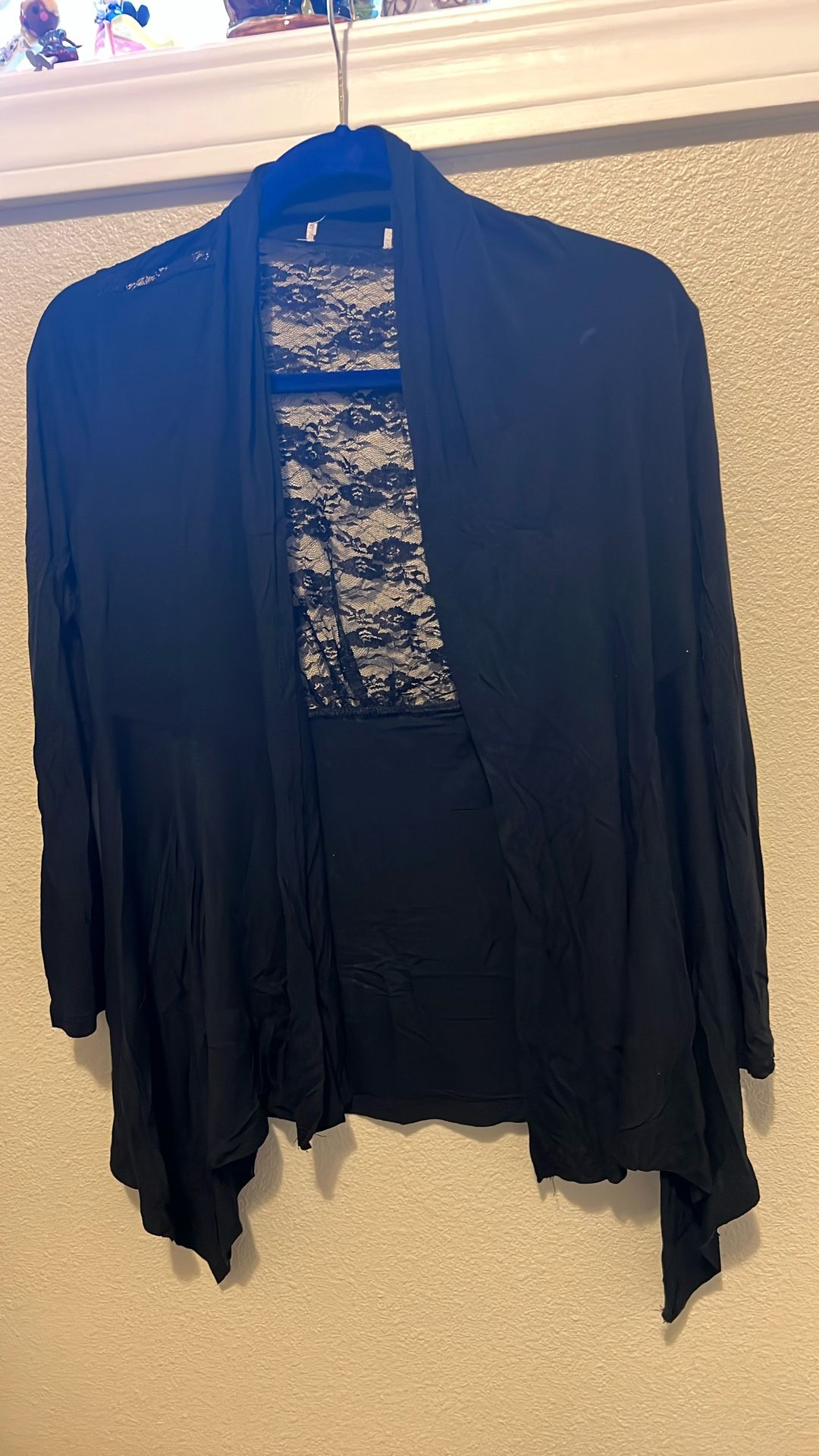 Little Black Jacket With The Lace Back