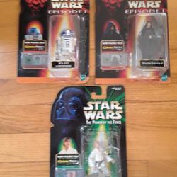 Vintage toys. Three 1999 star wars toys still sealed never used. 