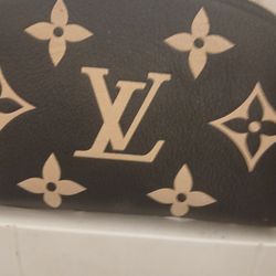 L. V. Coin Bag