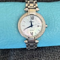 Seiko Tressia Women's Solar Dress Watch with Diamond Bezel SUT181