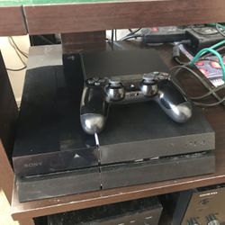 Sony PlayStation PS4 with Controller And 5 Games Bundle And Cables