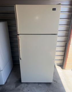 White Whirlpool Refrigerator And Freezer