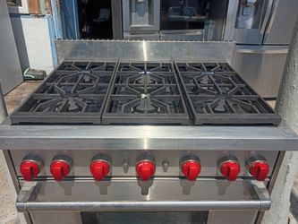 Wolf 6 burner stainless steel range/stove we'll deliver for the right $$ sold as is