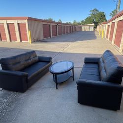 Two IKEA Couches With Coffee Table