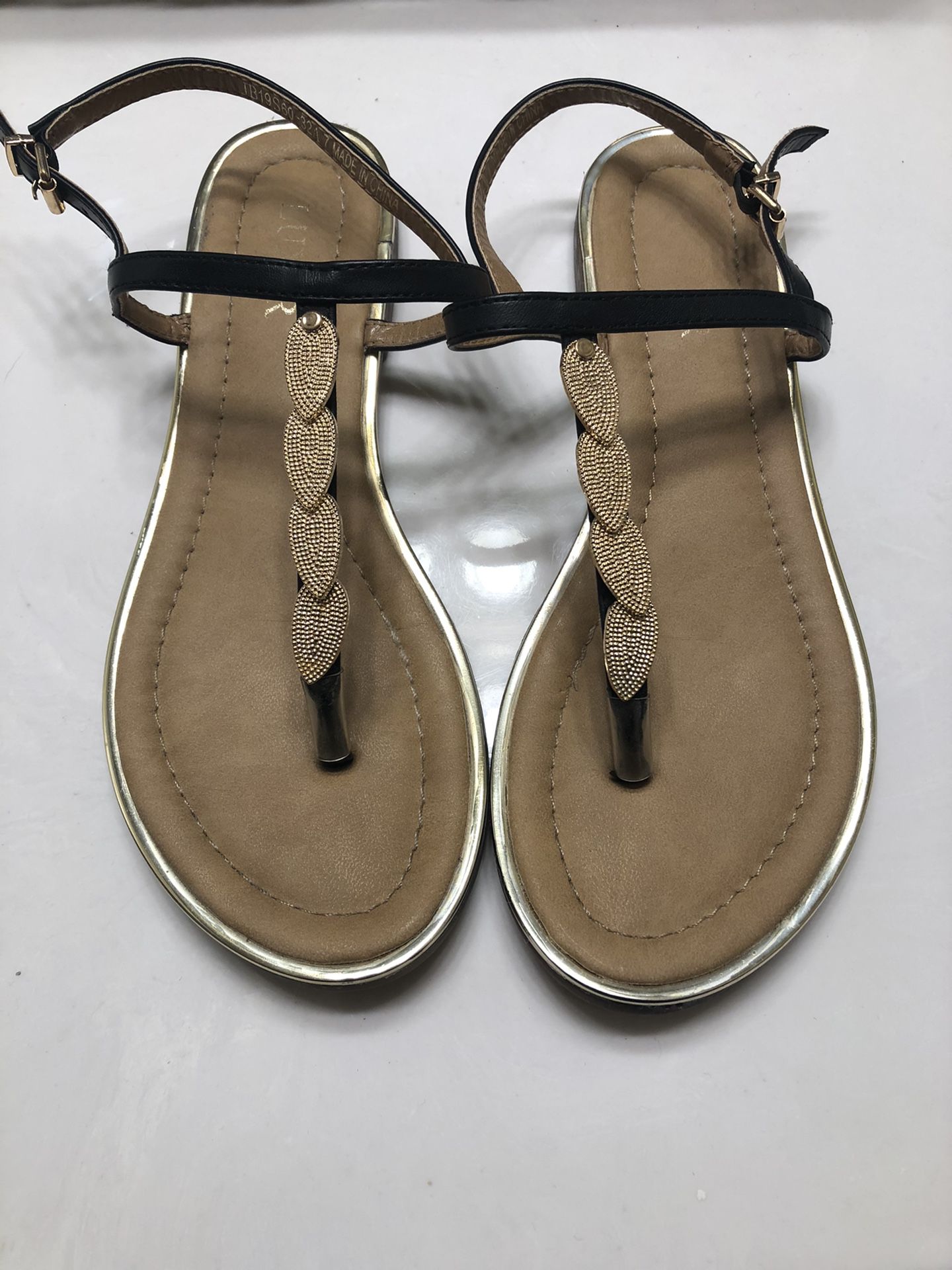 Black/gold boutique sandals
