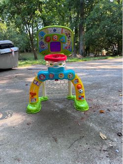 Toddler learning soccer goal