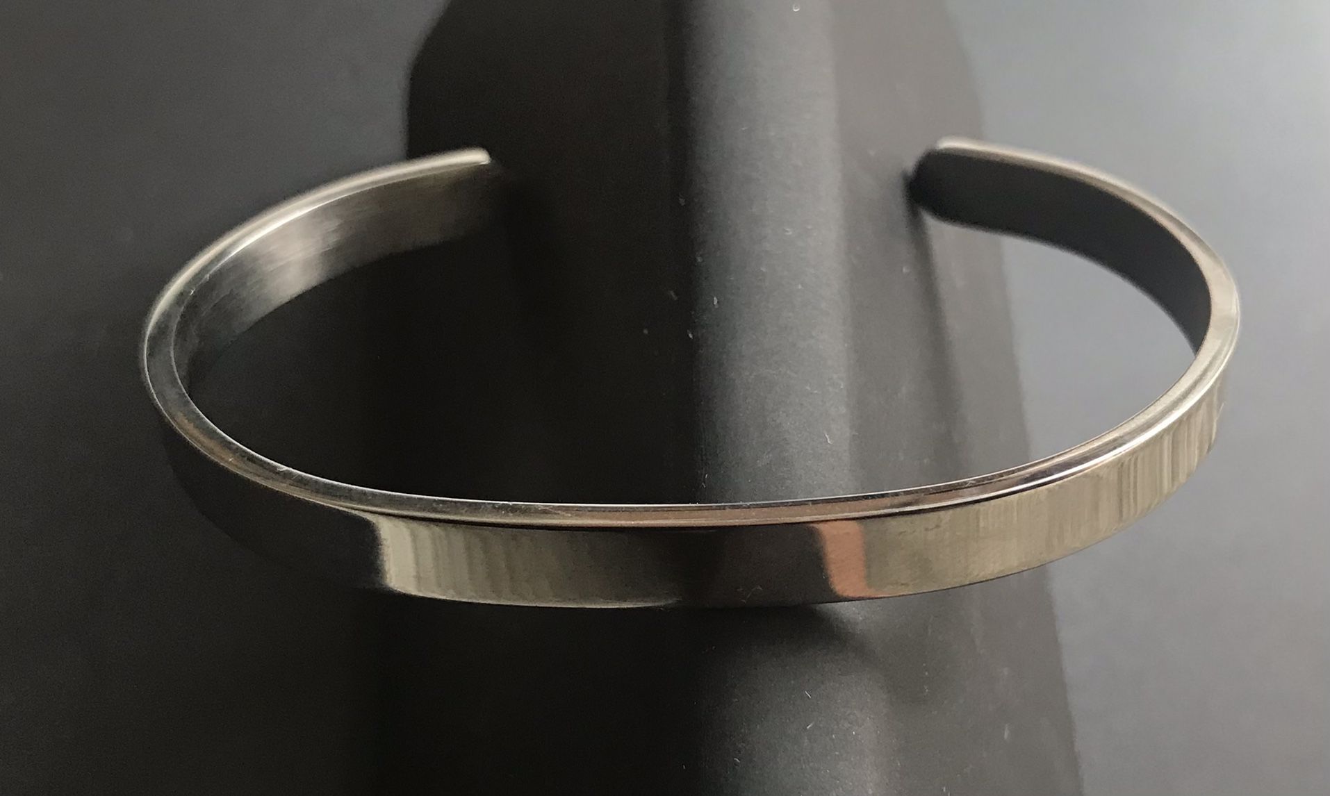 Silver color engraved open bracelet