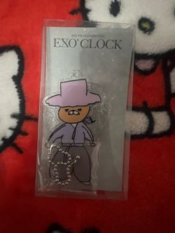 EXO Kai acrylic keychain with bear cartoon character wearing a purple hat