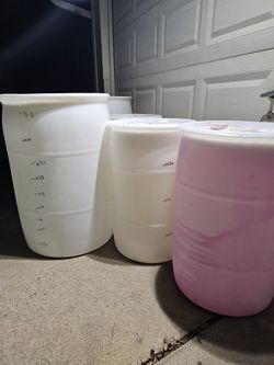 plastic barrels 55 gallon and 30 gallon