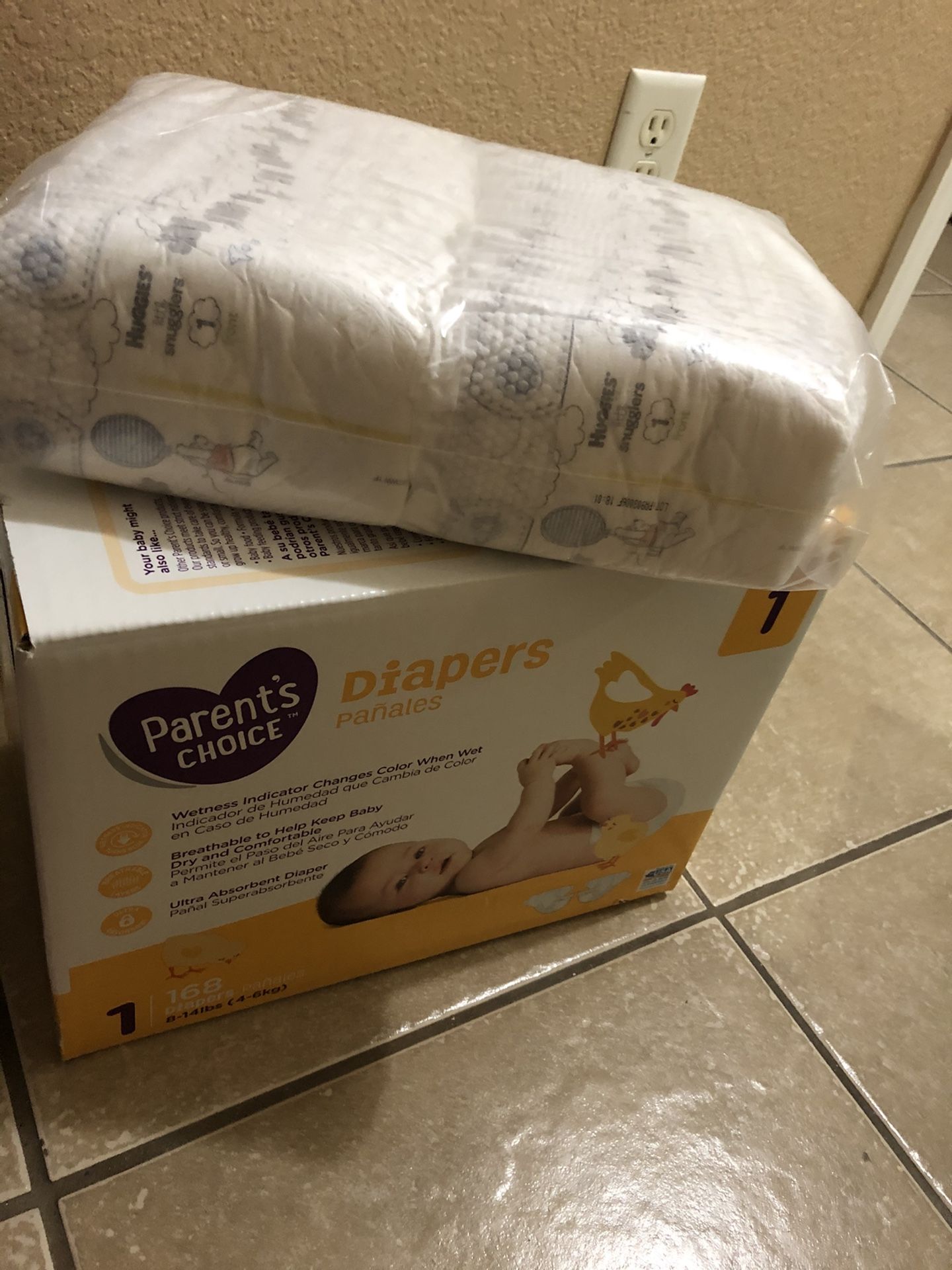 Parents choice size 1 selling 168 diapers into unopened box with bonus 50 huggies -Total 218 diapers size 1