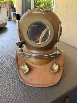 Vintage dive helmet lamp