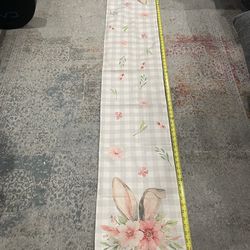 easter table runner with bunny, ears, and flowers. 71.5” Easter table runner with bunny, ears, and flowers.