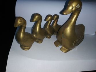 All brass mother and her ducklings