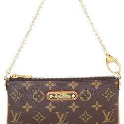 Louis Vuitton Monogram Pochette Milla MM clutch in monogram canvas with a gold-toned chain strap. 