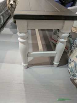 White wooden bench , brown top & bottom white