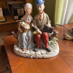 Elderly Porcelain Figure