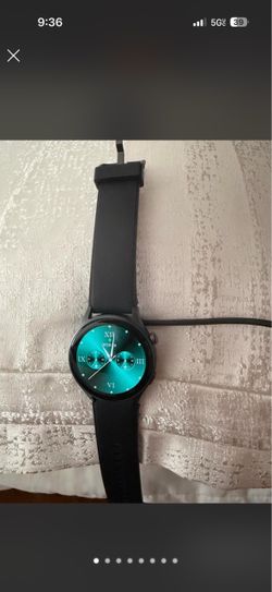 Black Smartwatch with Teal Display