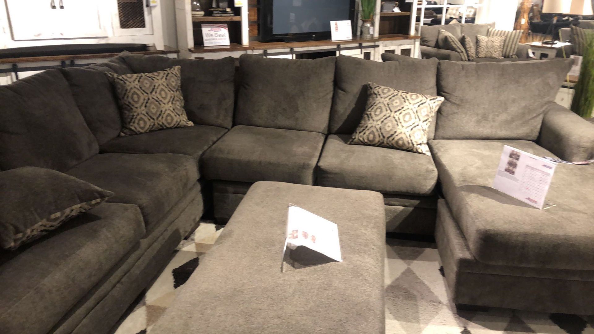 American Furniture Warehouse grey couch