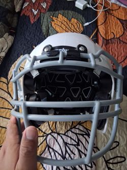 Helmet and shoulder pats semi new medium size youth