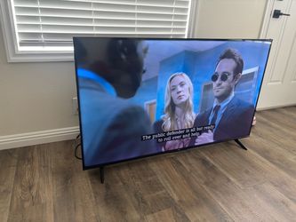 TCL Flat Screen TV with Stand