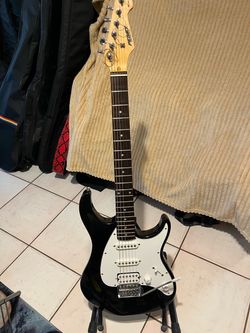 guitarra peavy raptor calibrada sonido exquisito cómo nueva calibrada