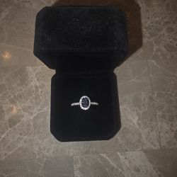  Blue Moissanite Halo Ring (925 Silver) –  💍 

Size 7