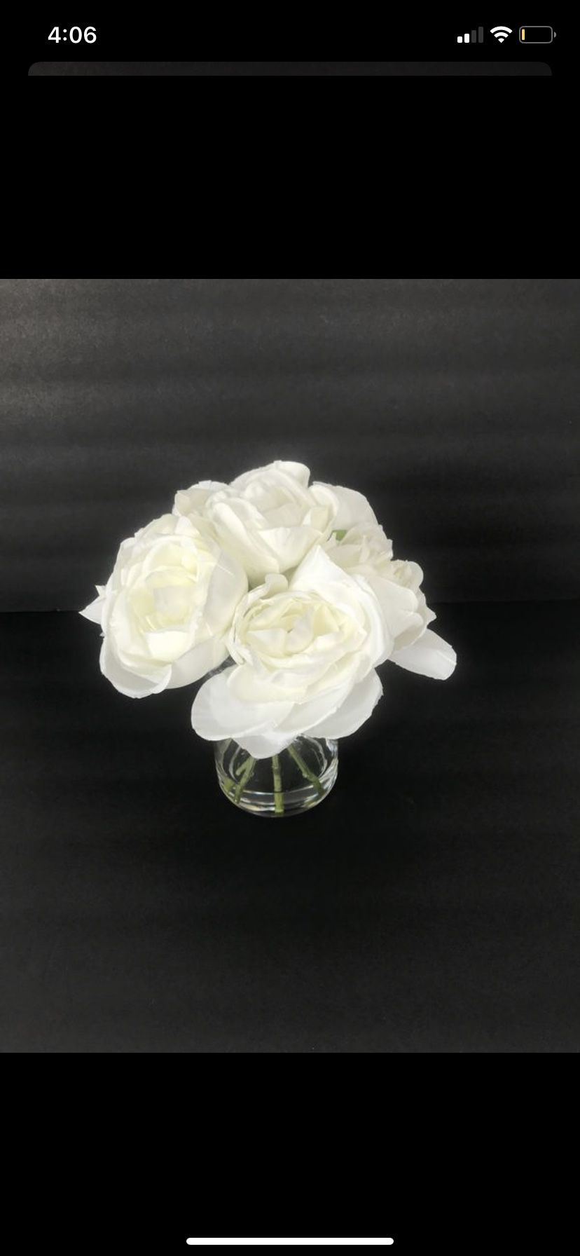 White flower bouquet decor with clear vase