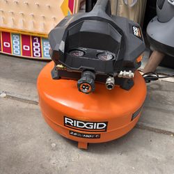 RIDGID 6 Gal. 150 PSI Portable Electric Oil-Free Jobsite Pancake Air Compressor with Dual Pressure Gauges and 2-Quick Couplers