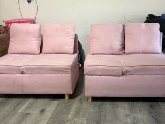 Two Pink pull out couches