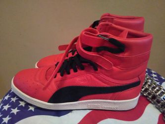 Brand new never worn puma leather hi tops size 11