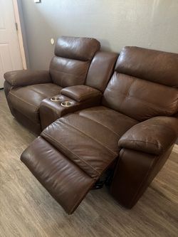 brown leather couches