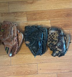 3 left hand Used t-ball boys Gloves