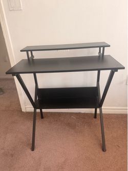 Small black desk w desktop riser