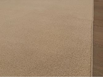 Area rug -new camel color 5’6” x 8’