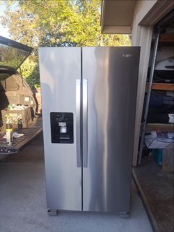 WHIRLPOOL SIDE BY SIDE STAINLESS STEEL REFRIGERATOR