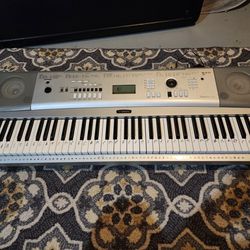 Yamaha DGX-230 76-Key Portable Keyboard With Stand And Power Supply.