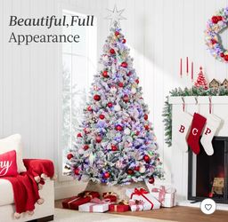 9-foot flocked Christmas tree, a perfect artificial Christmas tree for home, office, and party decorations.