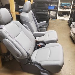 BRAND NEW GRAY LEATHER BUCKET SEATS WITH SEATBELTS 