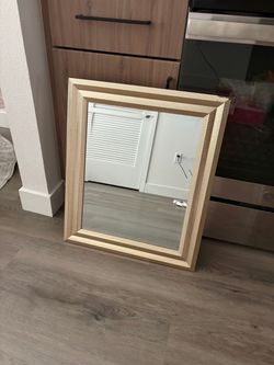Gold framed mirror